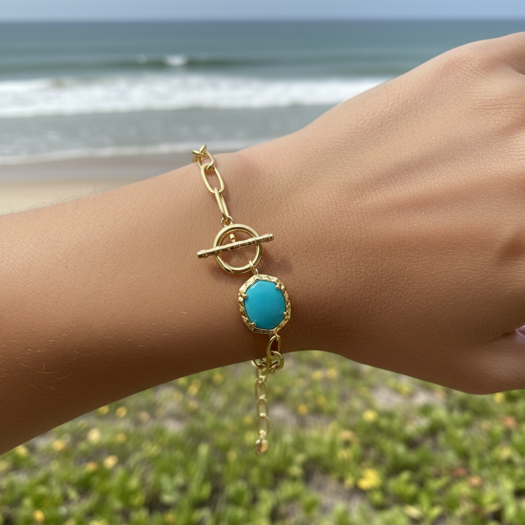 Kendra Scott Daphne Gold Link Turquoise Bracelet close-up on wrist lifestyle shot