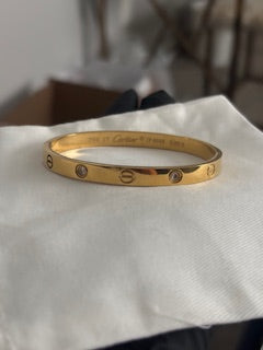 Cartier Love Bracelet — 18K Yellow Gold, 4 Diamonds, Size 17