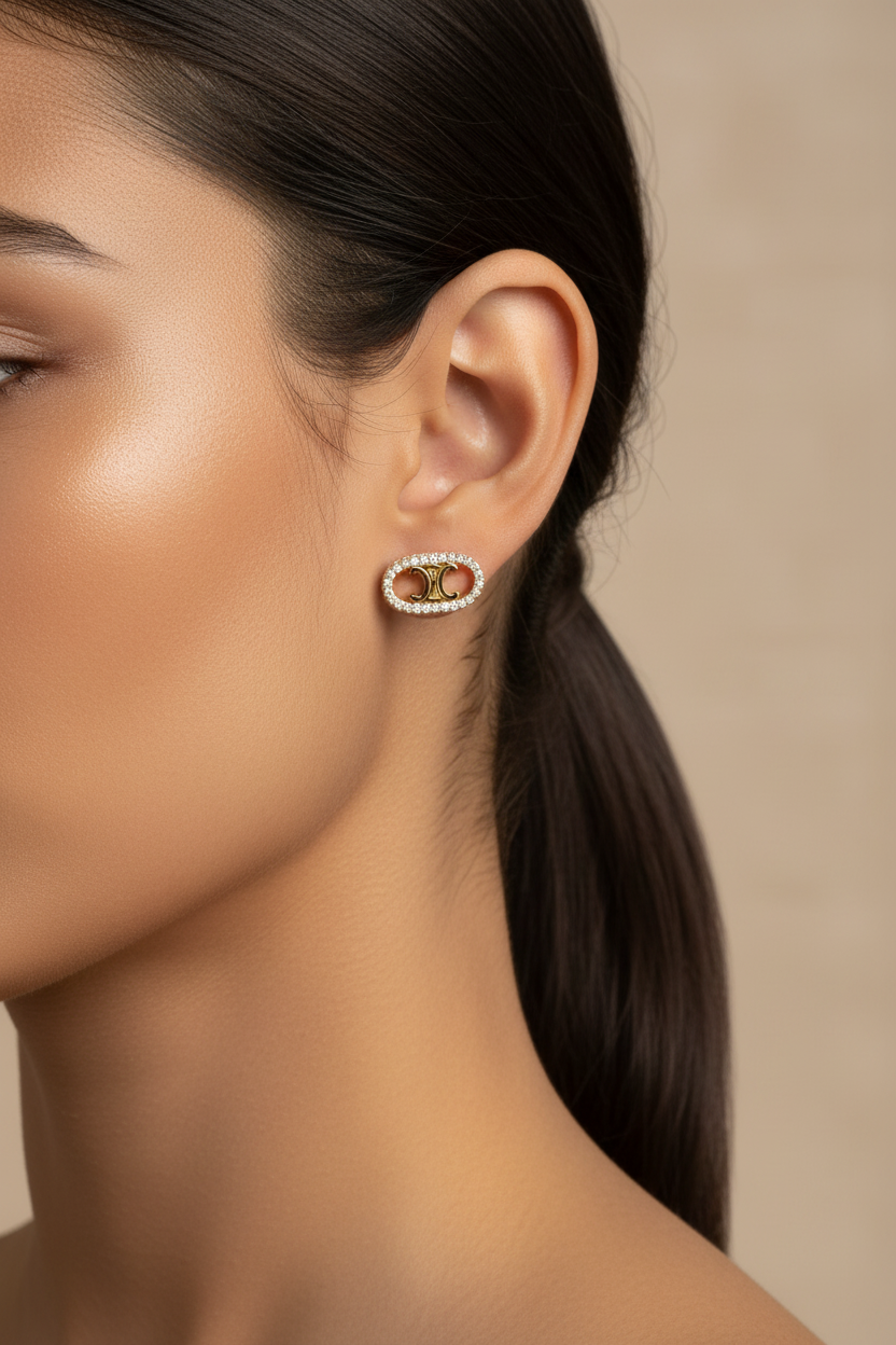 Celine Maillon Triomphe 18kt Gold and Diamond Stud Earring worn on ear