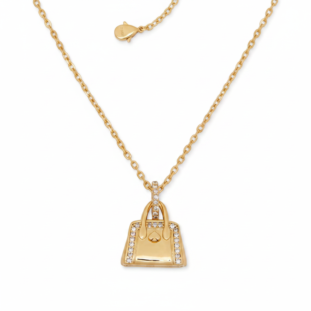 Kate Spade New York Goldtone Crystal Purse Hit the Town Pendant Necklace - clean product shot