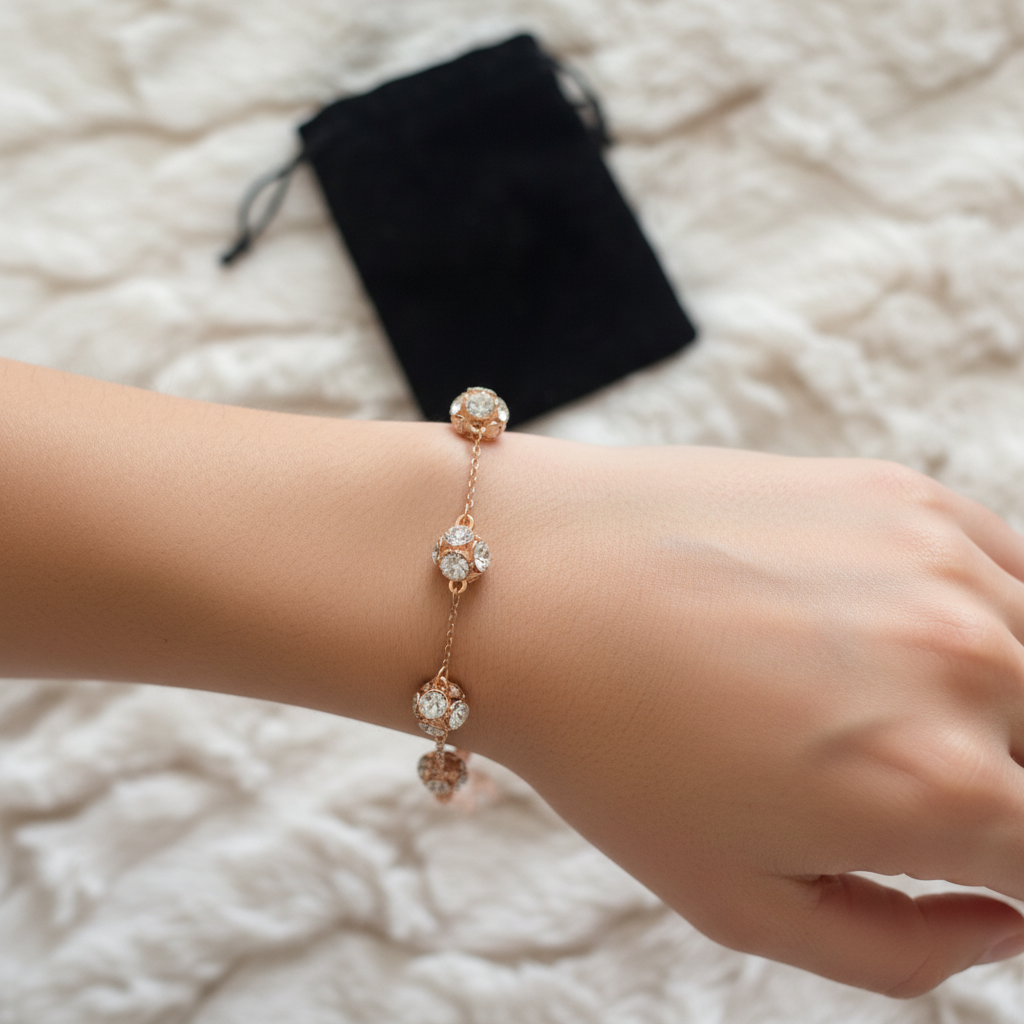 Kate Spade Lady Marmalade Rose Gold Bracelet on model wrist