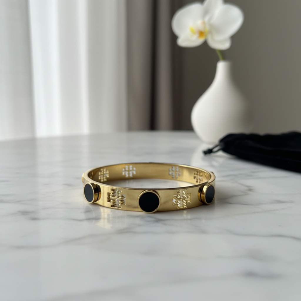 Tory Burch Logo Stud Black Circle Bangle - marble lifestyle shot