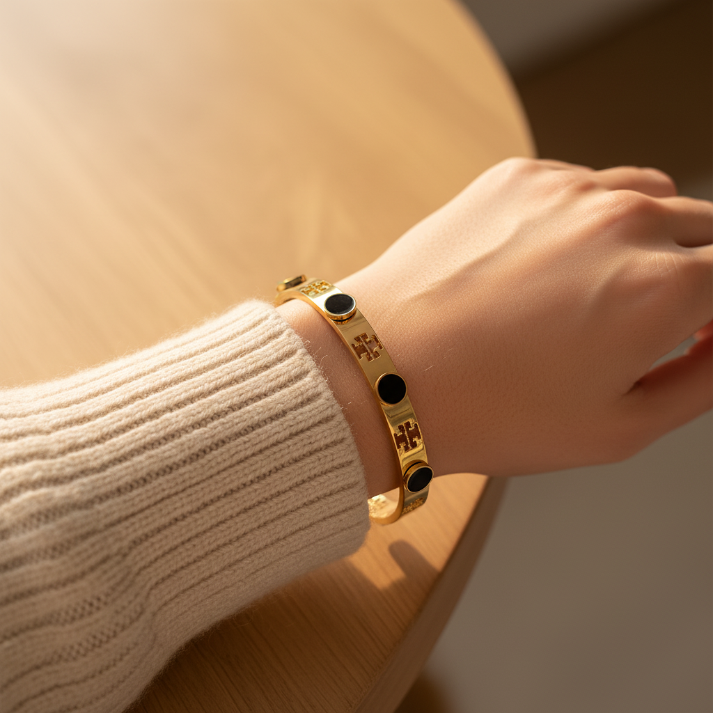 Tory Burch Logo Stud Black Circle Bangle - model wrist shot