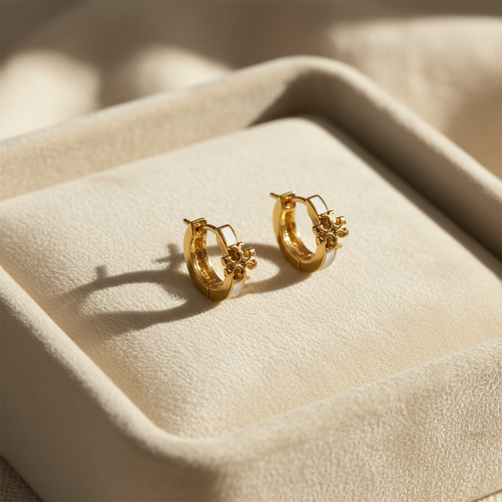 Tory Burch Icon White Enamel and Gold Huggie Earrings - cream velvet jewelry tray