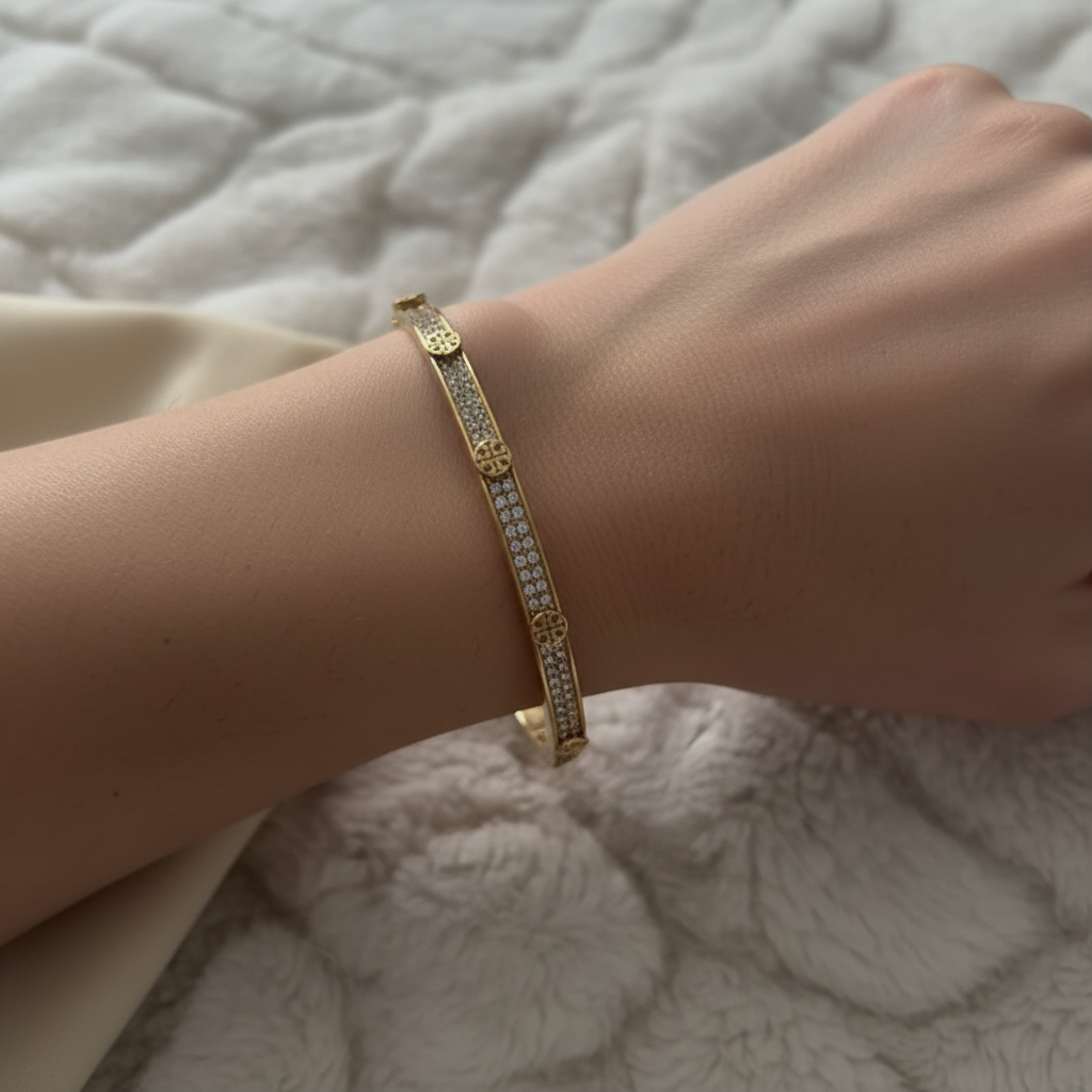 Tory Burch Icon Pavé Cuff worn on wrist