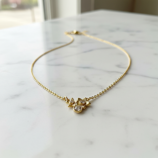 Coach Wildflower Pendant on marble