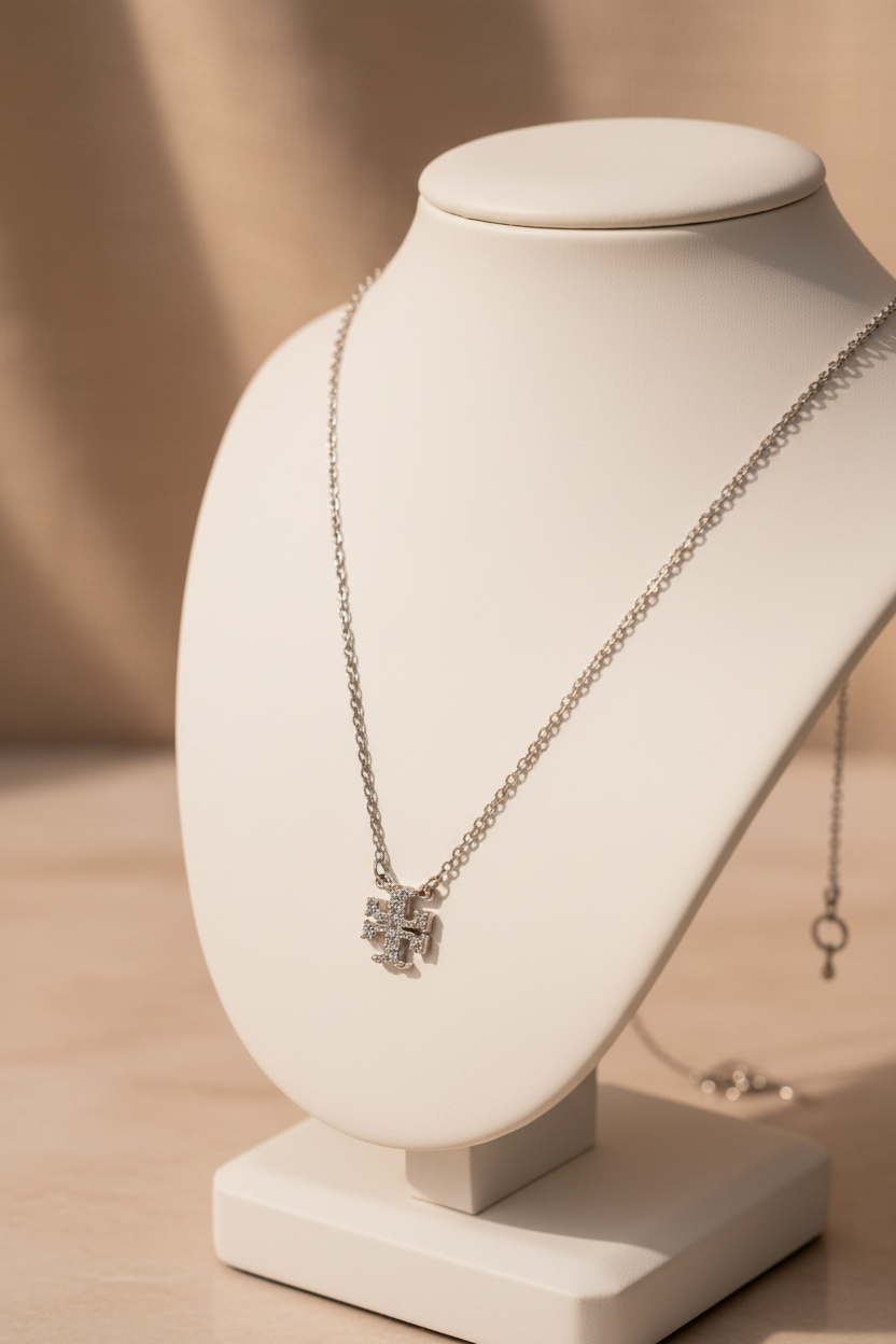 Tory Burch Kira Pave Necklace on jewelry stand