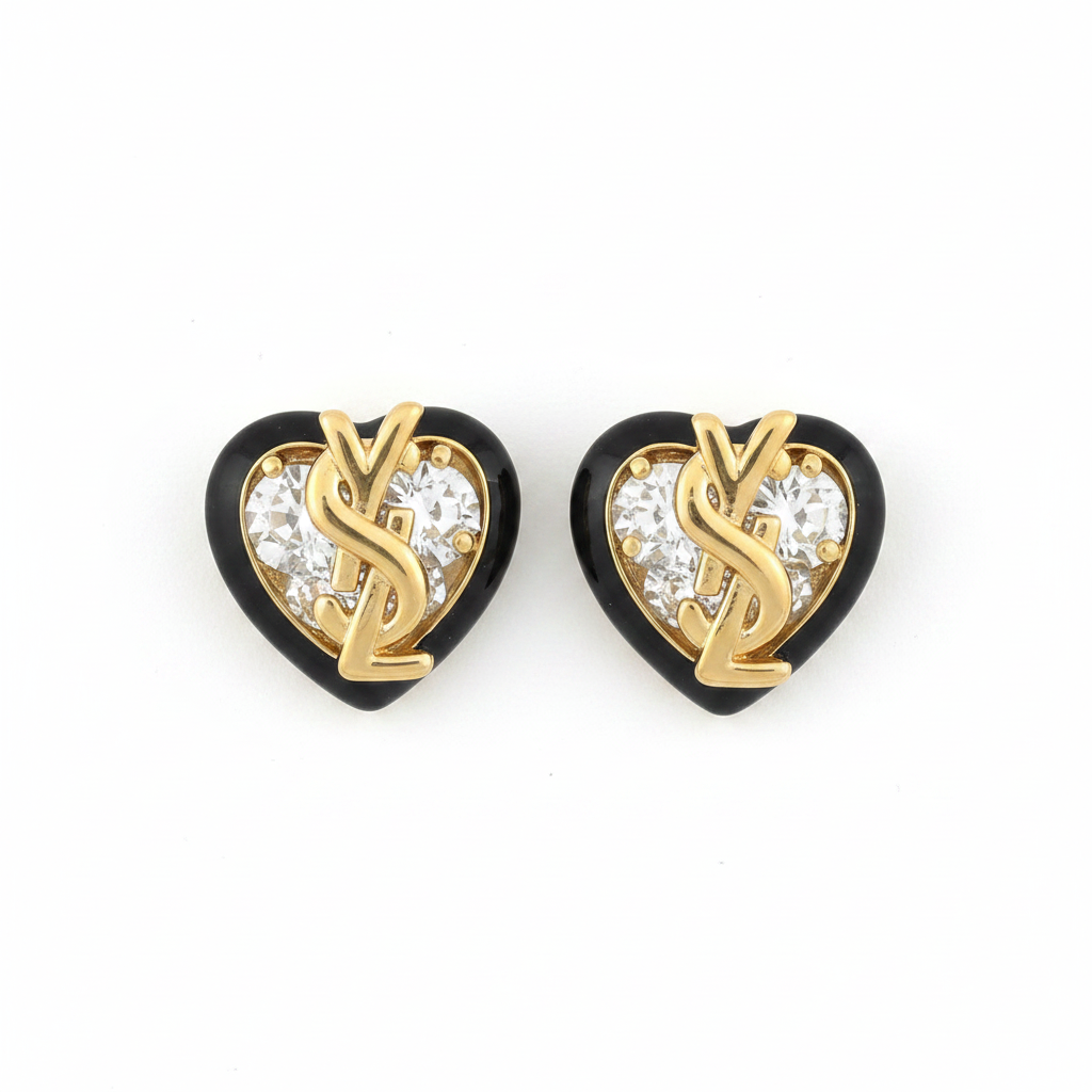 Yves Saint Laurent Logo Crystal Heart Earrings on white background