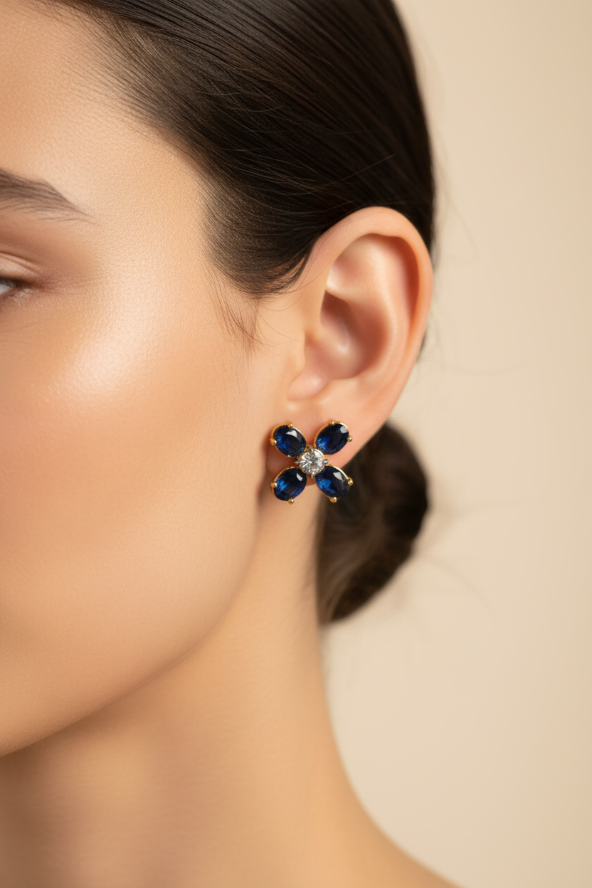 Tory Burch Buddy Clover Stud Earrings with Blue Crystal - worn on model's ear