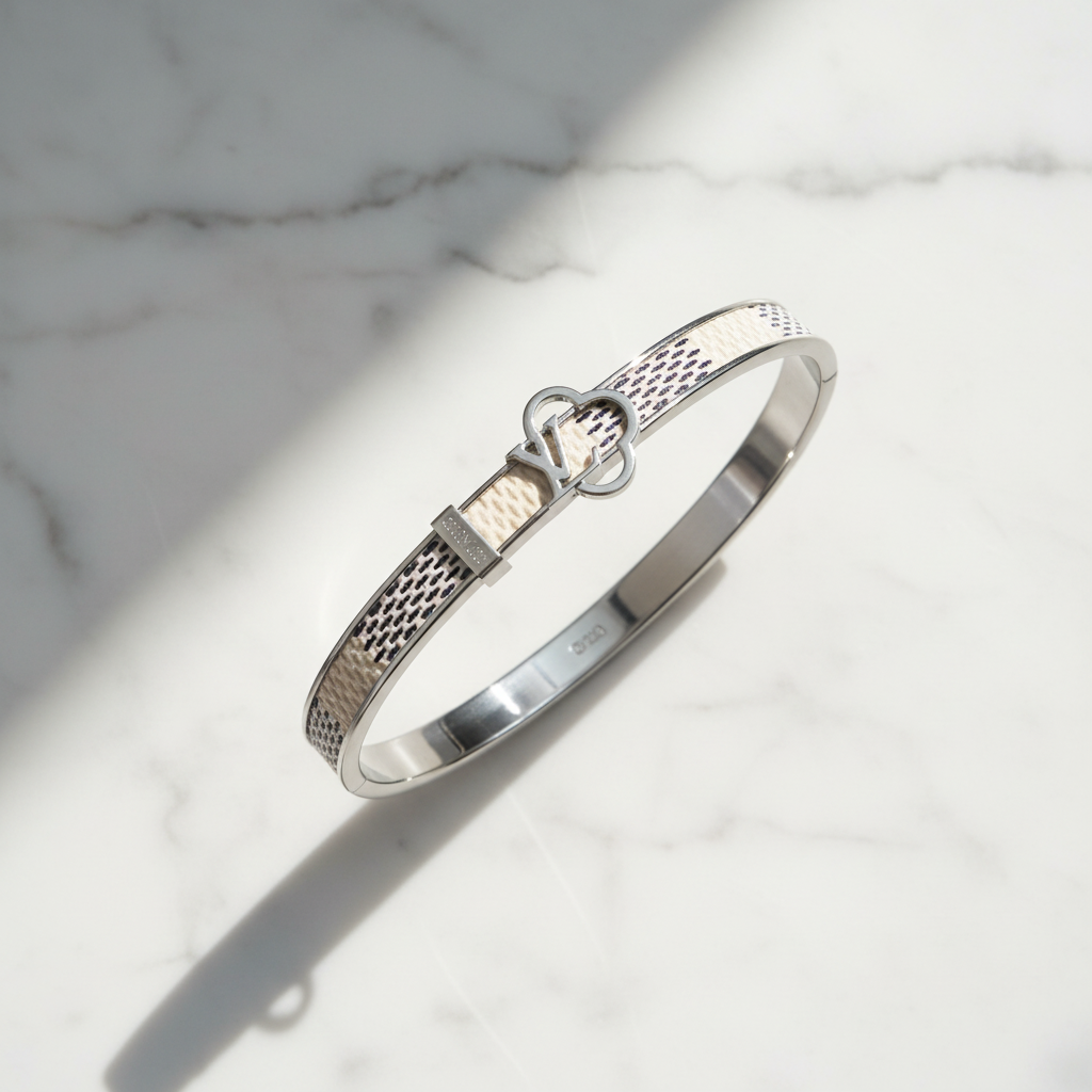 LV Damier Azur silver bangle bracelet flat lay on white marble
