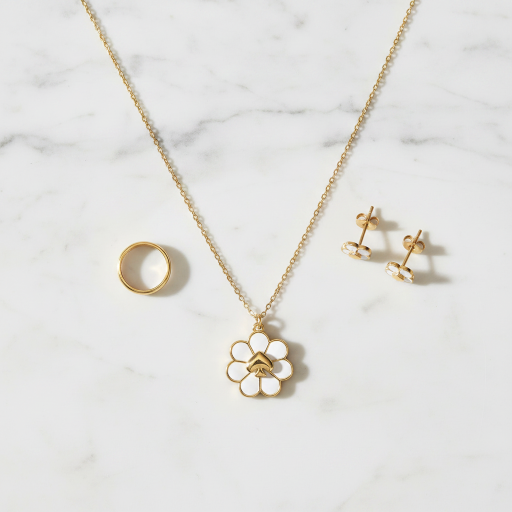 Kate Spade Day Tripper Necklace styled flat lay