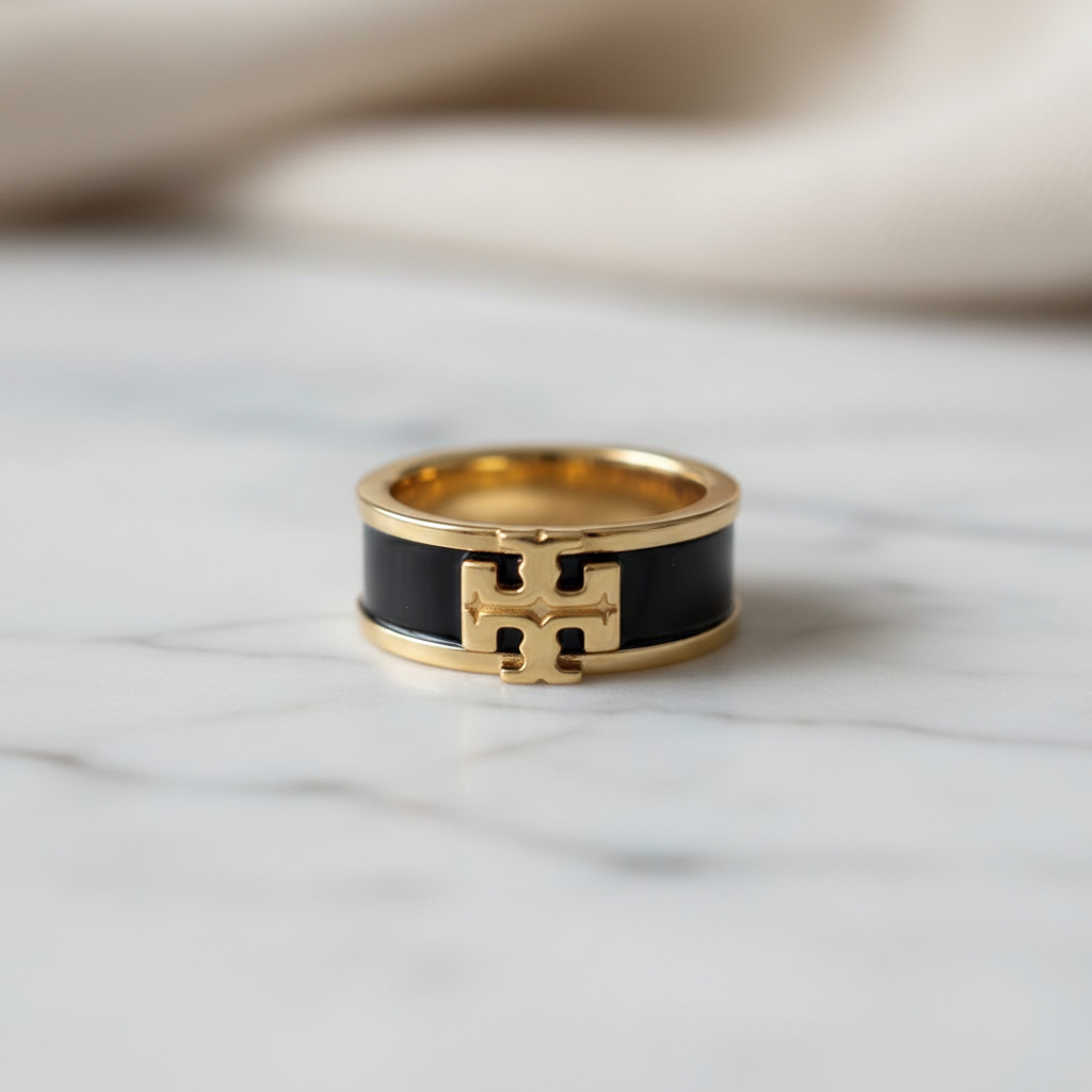 Tory Burch Kira Black & Gold Enamel Ring - marble surface