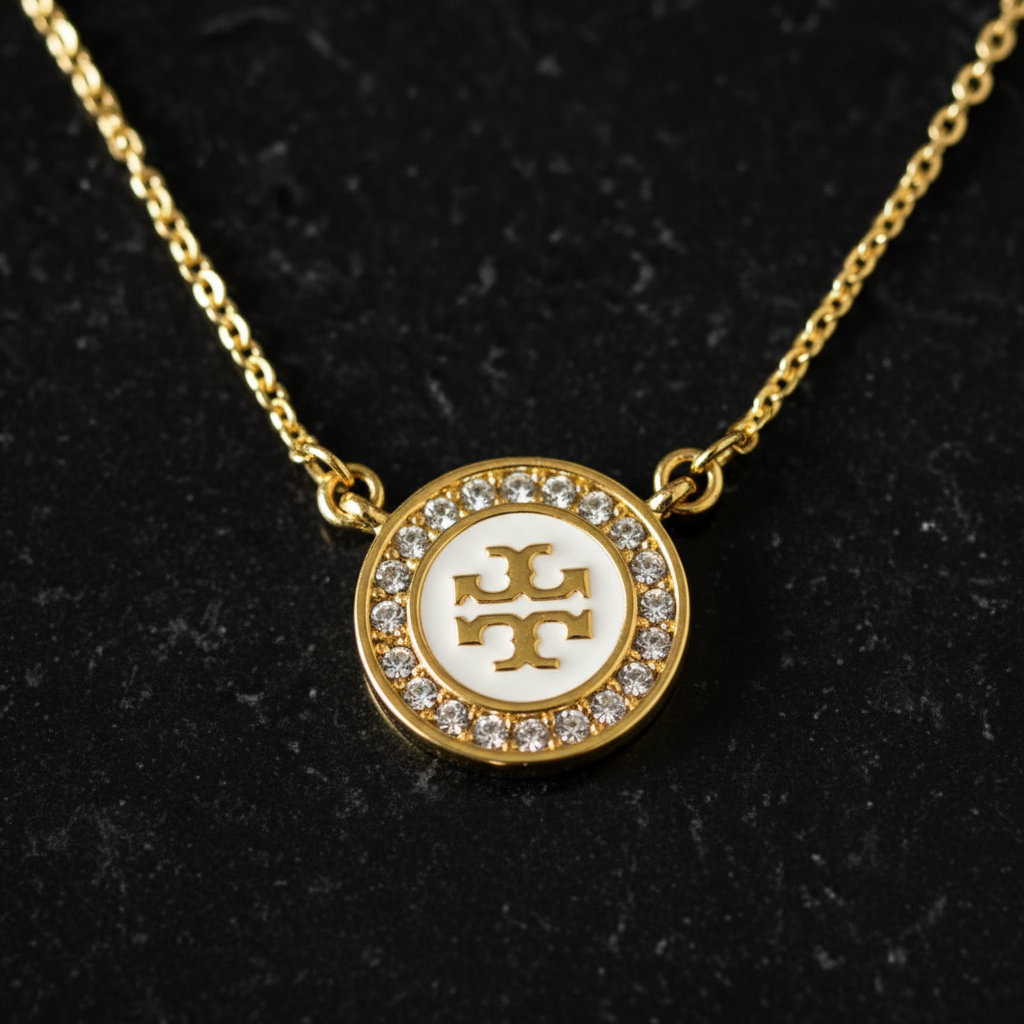 Tory Burch Icon Pavé Pendant Necklace - Macro close-up medallion detail