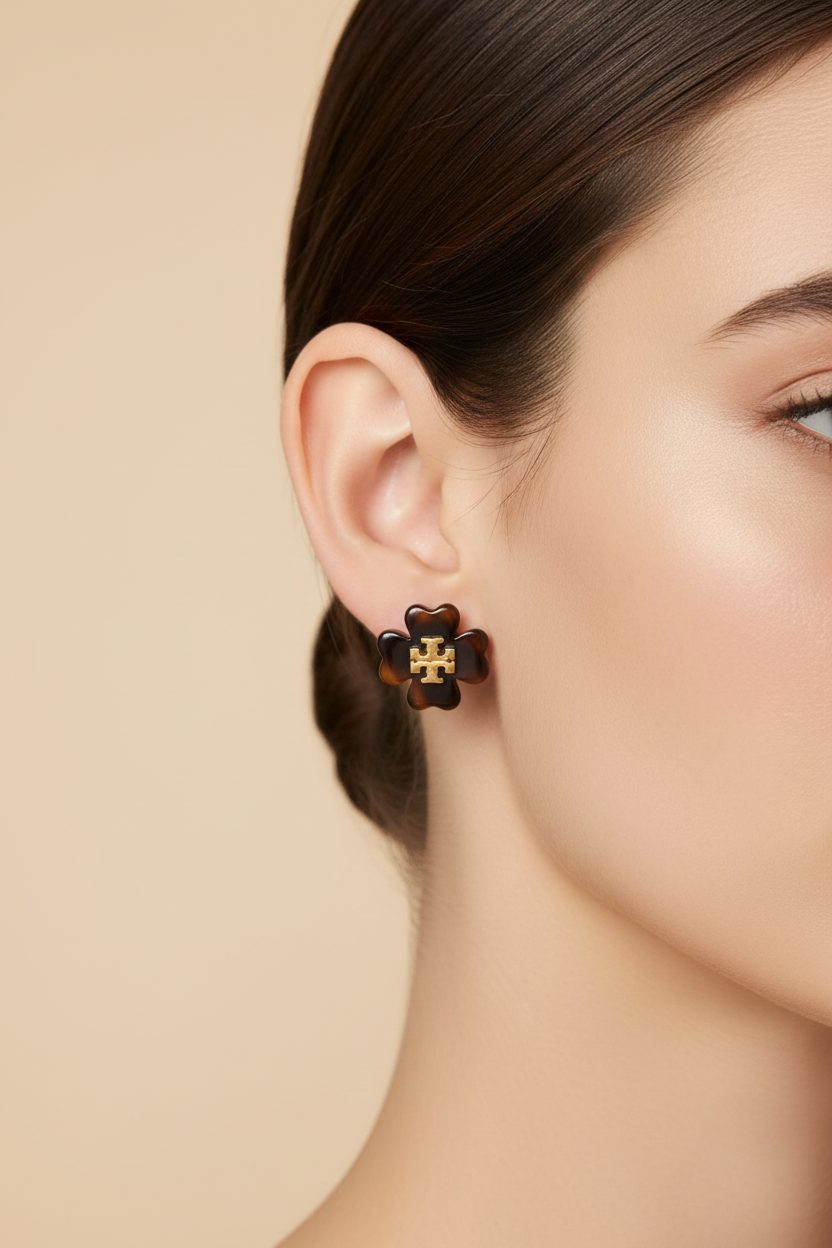Tory Burch Kira Flower Stud Earrings in Tortoiseshell - worn on model's ear
